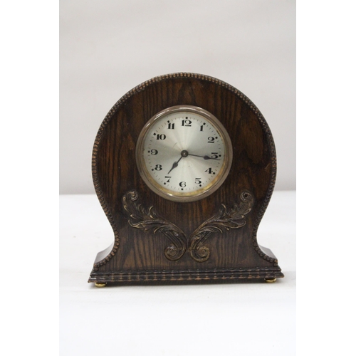 27 - AN ART DECO EIGHT DAY WOODEN MANTLE CLOCK