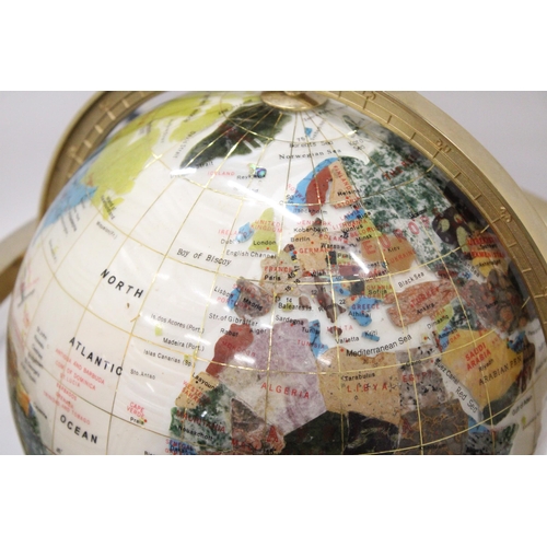 28 - A MOTHER OF PEARL WORLD GLOBE WITH SEMI-PRECIOUS STONES