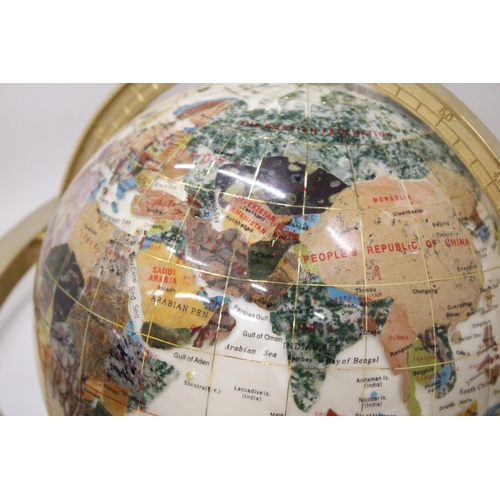 28 - A MOTHER OF PEARL WORLD GLOBE WITH SEMI-PRECIOUS STONES