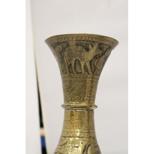 37 - A PAIR OF MIDDLE EASTERN BRASS VASES, HEIGHT 29CM