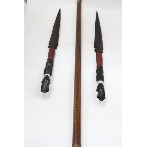 39 - A MILITARY SWAGGER STICK WITH TWO AFRICAN SPEARS