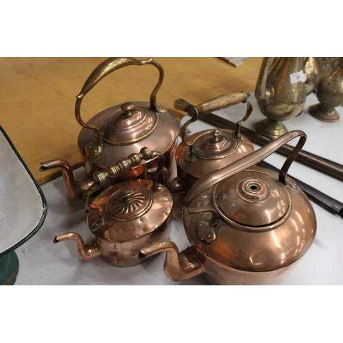 40 - FOUR GRADUATED COPPER KETTLES