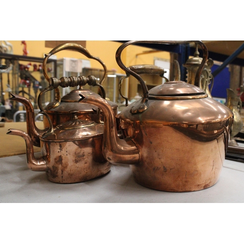 40 - FOUR GRADUATED COPPER KETTLES