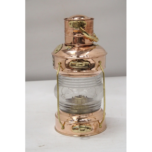 41 - A VINTAGE NAUTICAL BRASS AND COPPER ANCHOR OIL LAMP