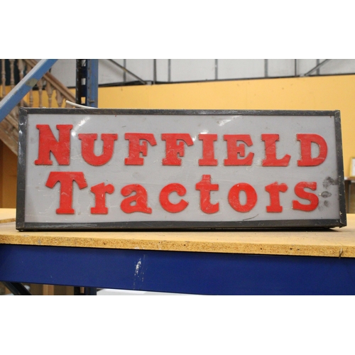 58 - AN ILLUMINATED NUFFIELD TRACTORS SIGN - 74 X 27 CM