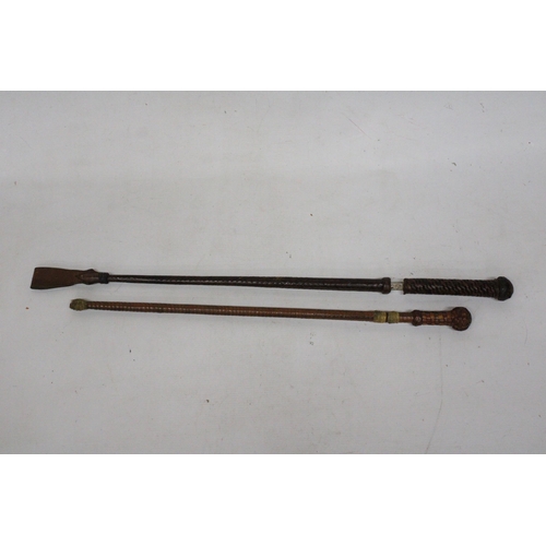 9 - TWO VINTAGE RIDING CROPS WITH DISPATCHER BLADES