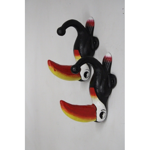 161 - A PAIR OF CAST GUINNESS TOUCAN COAT HOOKS