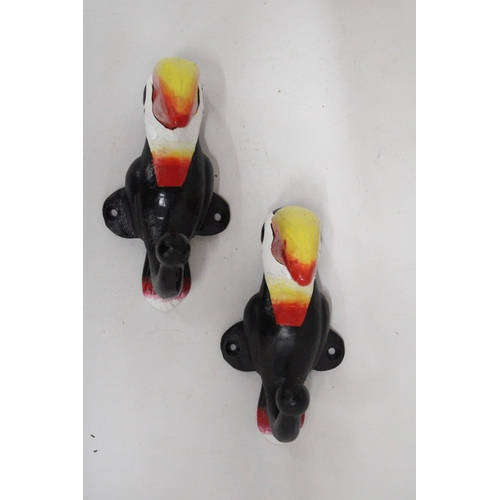 161 - A PAIR OF CAST GUINNESS TOUCAN COAT HOOKS