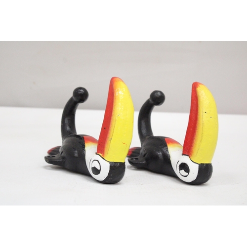 161 - A PAIR OF CAST GUINNESS TOUCAN COAT HOOKS