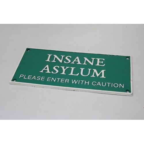 168 - A CAST INSANE ASYLUM SIGN, 27CM X 13CM