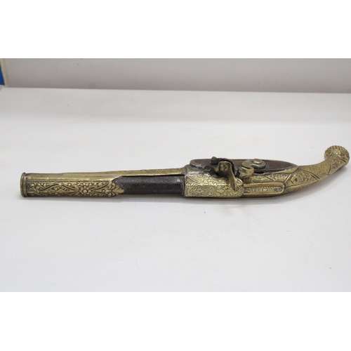 170 - A HEAVY BRASS ORNAMENTAL FLINTLOCK PISTOL