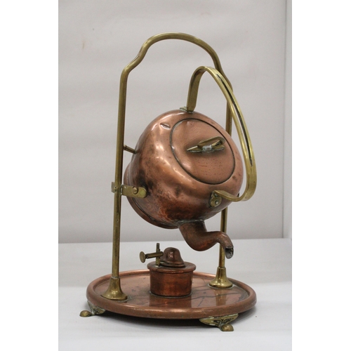 185 - A COPPER GAS PIVOT KETTLE