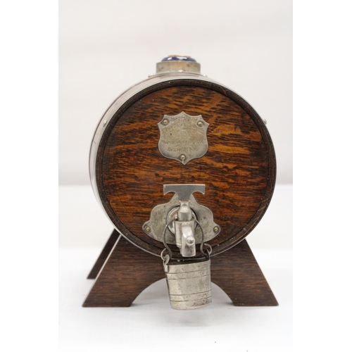 188 - AN EDWARDIAN OAK WHISKY BARREL (1931)