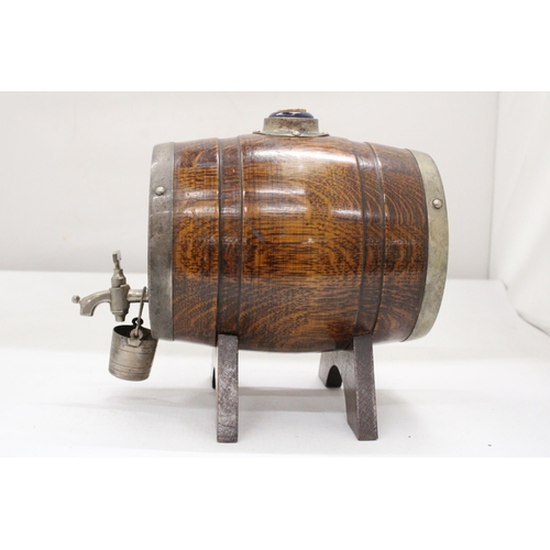 188 - AN EDWARDIAN OAK WHISKY BARREL (1931)