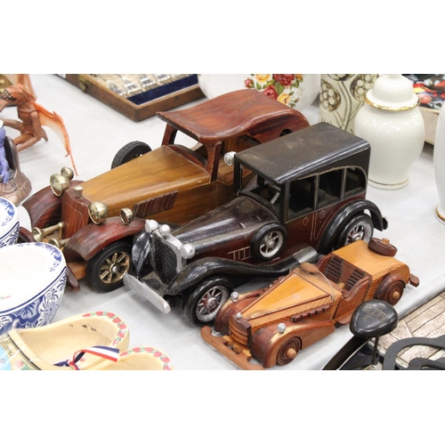 194 - THREE VINTAGE WOODEN CARS