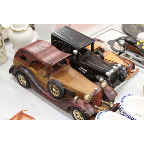 194 - THREE VINTAGE WOODEN CARS