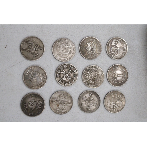 195 - A COLLECTION OF CHINESE TOKENS