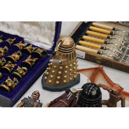 197 - A COLLECTION OF NINE DR WHO FIGURES TO INCLUDE DALEKS