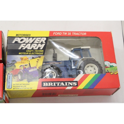 479 - THREE BRITAINS 1:32 SCALE MODELS TO INCLUDE A MOTORISED POWER FARM FORD TW 35 TRACTOR, A POWERFARM V... 