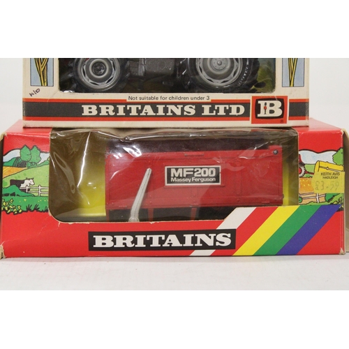 487 - TWO VINTAGE BRITAINS FARM MODELS TO INCLUDE A MASSEY FERGUSON 595, CAT. NO. 9522 AND A MASSEY FERGUS... 