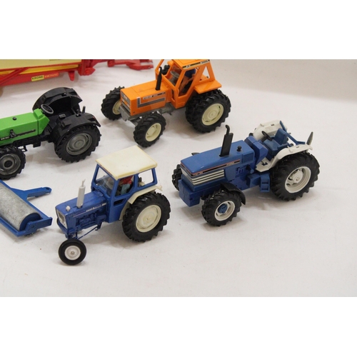 498 - SIX BRITAINS MODELS TO INCLUDE A FORD TW-35 TRACTOR, A FORD 6600 TRACTOR, AN ORANGE TRACTOR, DX110 T... 