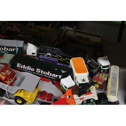 257 - A LARGE COLLECTION OF DIE-CAST MODEL TRUCKS, TRAILERS AND LOADS