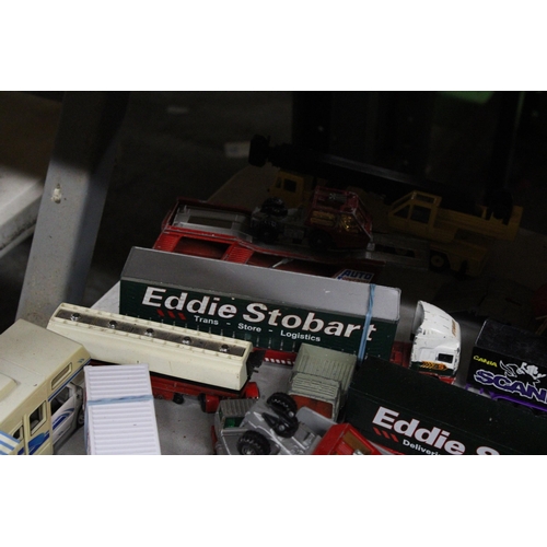 257 - A LARGE COLLECTION OF DIE-CAST MODEL TRUCKS, TRAILERS AND LOADS