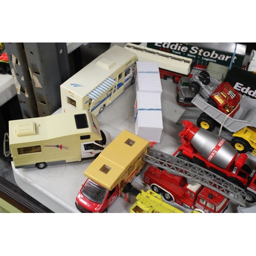 257 - A LARGE COLLECTION OF DIE-CAST MODEL TRUCKS, TRAILERS AND LOADS