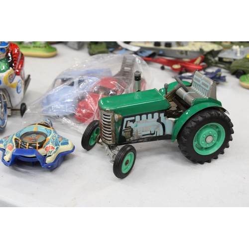 262 - FIVE VINTAGE TIN PLATE AND FRICTION DRIVEN TOY VEHICLES TO INCLUDE, A ZETOR TRACTOR, A JAPANESE MOTO... 