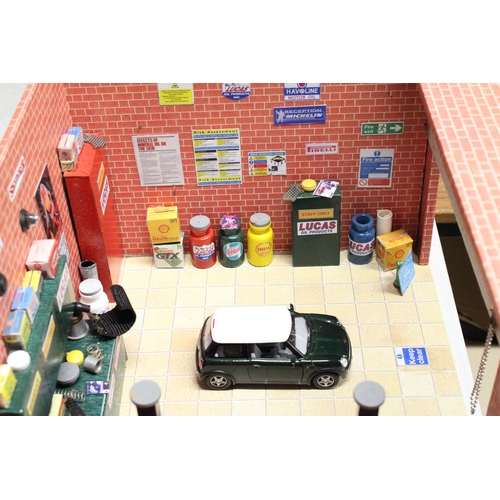 268 - A MODEL GARAGE, MADE INTO A MAN CAVE, PLUS A DANBURY, MINT 1966 THUNDERBIRD AND A MINI CAR