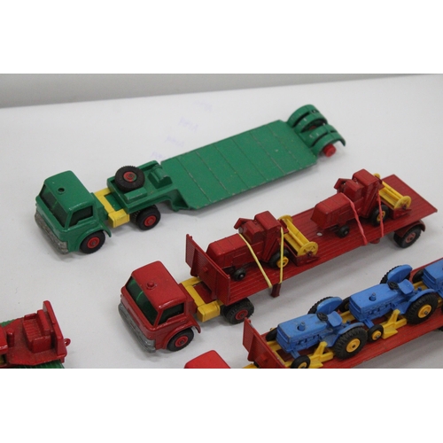 382 - THREE FORD LOW LOADERS WITH THREE TRACTORS ON BOARD, TWO COMBINE HARVESTERS, A CASE DOZER, A MUIR-HI... 