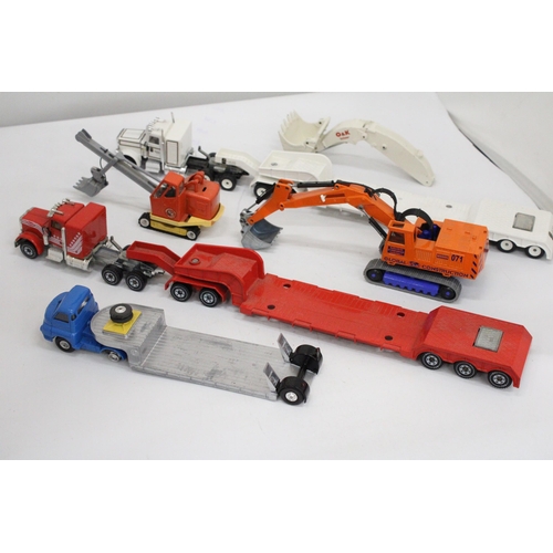 385 - THREE SIKU MODELS WITH MACHINES ON BOARD, PLUS A CORGI TK BEDFORD WITH A PRIESTMAN LOADER ON BOARD -... 