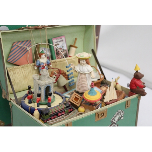 391 - AN ENESCO 'TREASURE CHEST OF TOYS' MUSICAL MASTERPIECE - BOXED