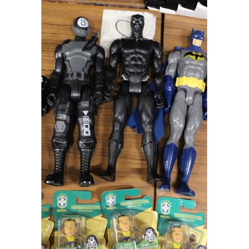 398 - THREE ACTION FIGURES TO INCLUDE BATMAN, TWO ARTICULATED ROBOTS AND FIVE SOCCER STARZ FIGURES