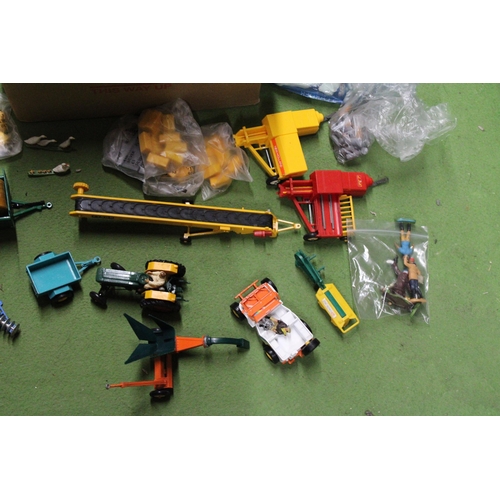 529 - A LARGE QUANTITY OF BRITAINS 1:32 SCALE FARMYARD MODELS AND ACCESSORIES TO INCLUDE TRACTORS, A HAY B... 