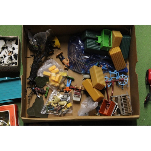 534 - A QUANTITY OF BRITAINS FARMYARD MODELS AND ACCESSORIES TO INCLUDE A TRACTOR, TRAILERS, FARMYARD IMPL... 