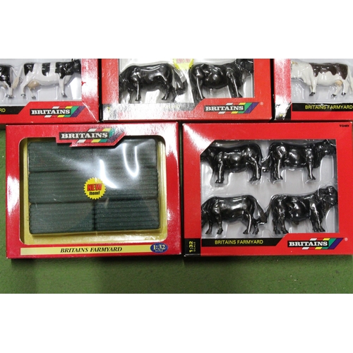 538 - FOUR BOXES OF BRITAINS 1:32 SCALE COWS AND A BOX OF WRAPPED HAY BALES - ALL AS NEW IN BOXES