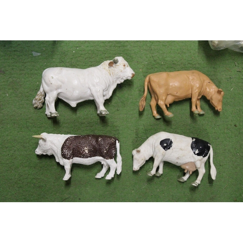 540 - FOUR BAGS OF BRITAINS 1:32 SCALE COWS - IN GOOD USED CONDITION