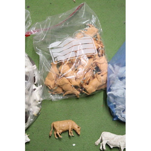 541 - FOUR BAGS OF BRITAINS 1:32 SCALE COWS - IN GOOD USED CONDITION