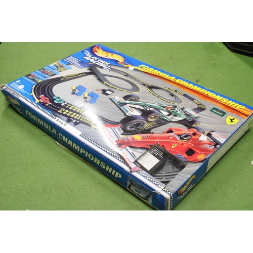 548 - A HOT WHEELS FORMULA CHAMPIONSHIP, ELECTRIC RACING SET