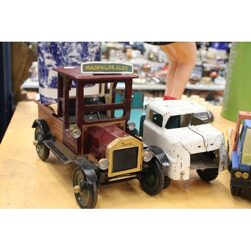 564 - THREE LARGE VINTAGE TRUCKS, TWO METAL AND ONE WOODEN, ONE SCRATCH BUILT