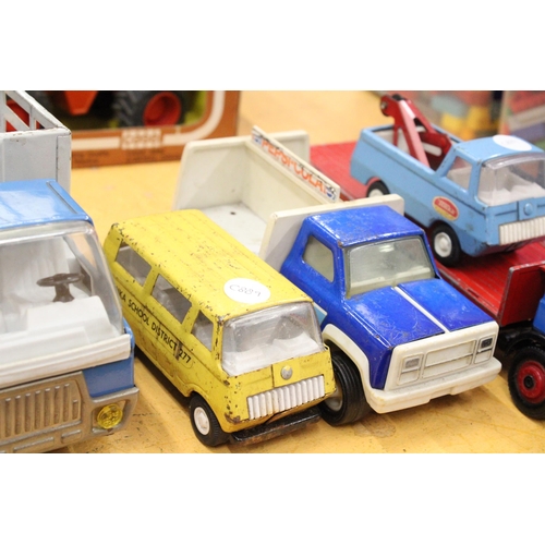 565 - FIVE VINTAGE MODEL TRUCKS TO INCLUDE THREE TONKA AND ONE BRITAINS