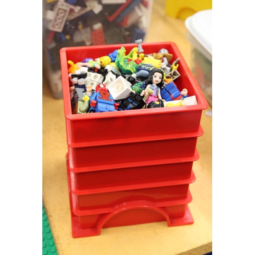 568 - FOUR LEGO BRICK STORAGE CONTAINERS FULL OF LEGO FIGURES AND ACCESSORIES