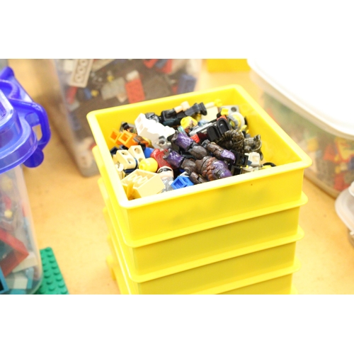 568 - FOUR LEGO BRICK STORAGE CONTAINERS FULL OF LEGO FIGURES AND ACCESSORIES