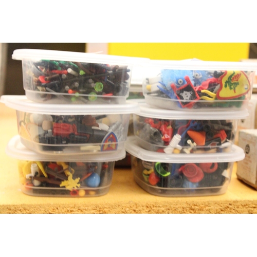 569 - A LARGE QUANTITY OF LEGO FIGURES AND ACCESSORIES IN 7 STORAGE CONTAINERS