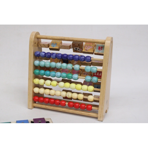 584 - AN ABACUS WITH LETTER BLOCKS, WOODEN JIGSAW AND VINTAGE FISHER PRICE XYLOPHONE