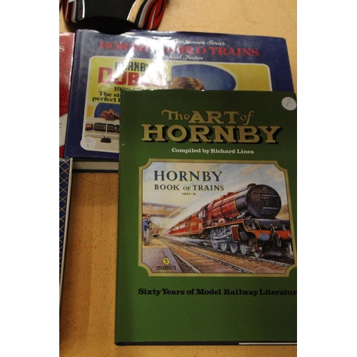 586 - FOUR MODEL RAILWAY HARDBACK AND VEHICLE BOOKS TO INCLUDE, THE ART OF HORNBY, HORNBY, DUBLO TRAINS, D... 