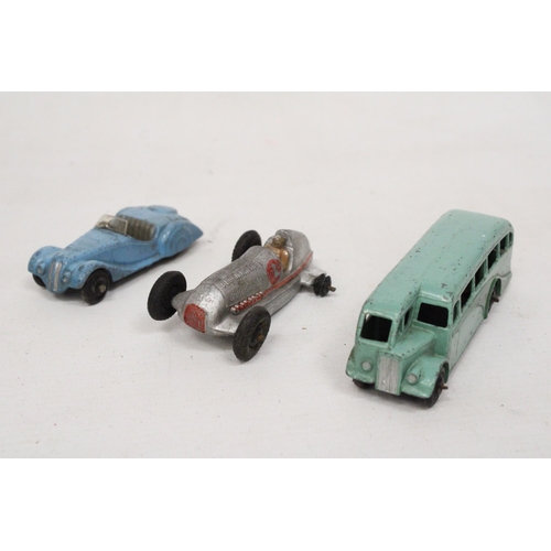 588 - SIX VINTAGE DINKY TOYS TO INCLUDE A 23C MERCEDES BENZ RACING CAR, A SINGLE DECK HALF CAB BUS, A LAGO... 