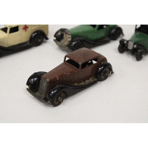 589 - FOUR VINTAGE DINKY MODELS TO INCLUDE A POST WAR BENTLEY, A PRE-WAR TAXI, A POST WAR HUMBER VOGUE AND... 