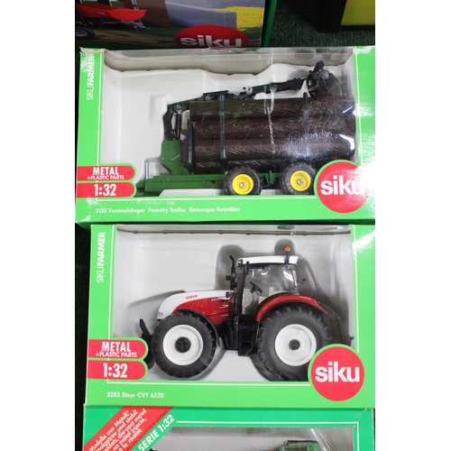 206 - FOUR SIKU 1:32 SCALE FARM MODELS TO INCLUDE A STEYR CVT 6230 TRACTOR, A BERGMANN MANURE SPREADER, A ... 